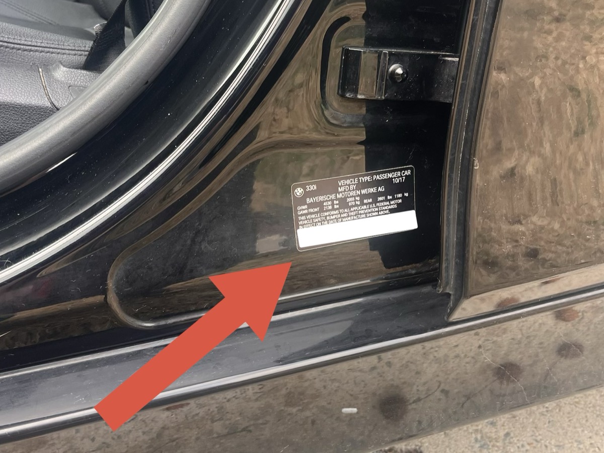 VIN number location on driver's side door jamb of European auto at Import Services Greenville NC